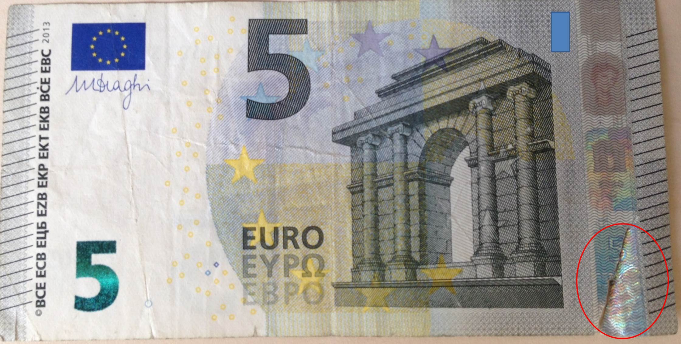 5 euro abîmé.jpg